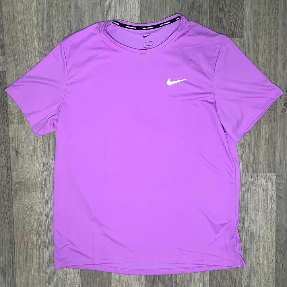 purple pink nike shirt